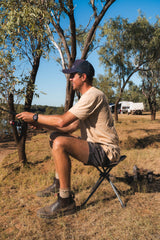 WILDTRAK™ AYR Foldable 4 Leg Stool, Compact, Lightweight, Fishing and Camp Chair, Weight Rated 120kg, Carry Bag with Shoulder Strap