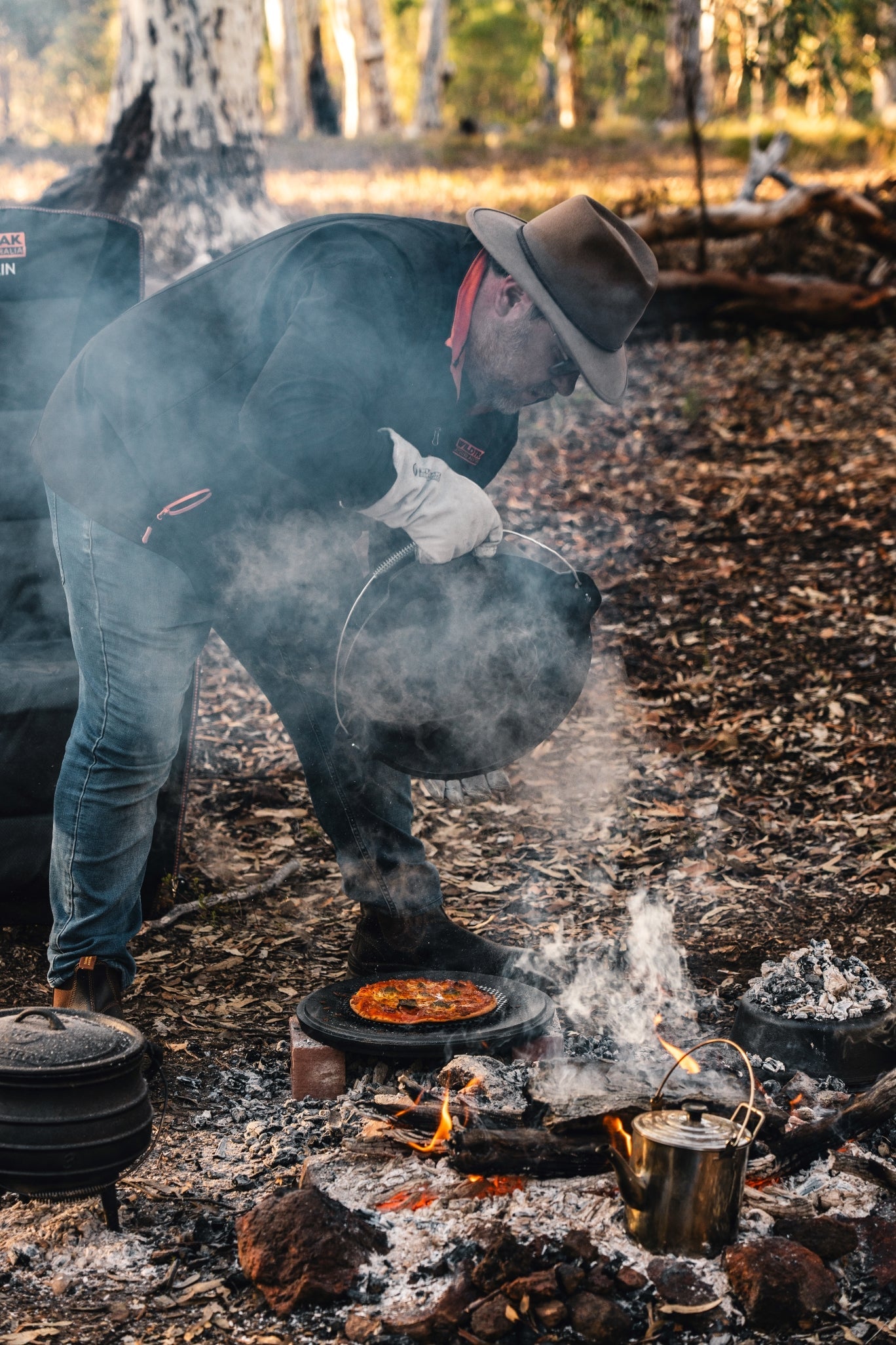Wildtrak™ 12 Quart Heavy Duty Pre-Seasoned Round Cast Iron Camp Oven with Lip and Handle